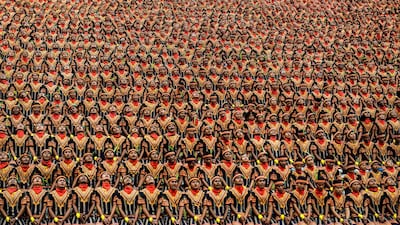 Indonesian men take part in a rehearsal of a mass traditional Saman dance - known as the "dance of a thousand hands". Chaideer Mahyuddin / AFP Photo / August 12, 2017