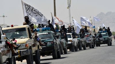 Taliban fighters celebrate in Kandahar on September 1, 2021, after the US pulls its troops out of Afghanistan after nearly 20 years. AFP