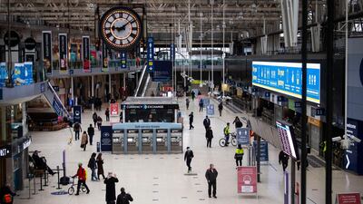Commuters in Waterloo Station during the morning rush hour in London. AP Photo