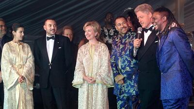 King Mohammed VI and Morocco's Princess Lalla Meryem, left, meet then US President and First Lady Bill and Hillary Clinton with the band Earth, Wind and Fire at the White House in June 2000. AFP