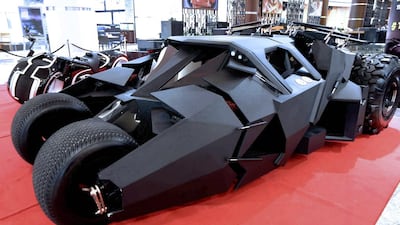 A Batmobile and bike used in one of the Batman movies on display at the Roaring Engines Like Never Before show in Sharjah. Pawan Singh / The National
