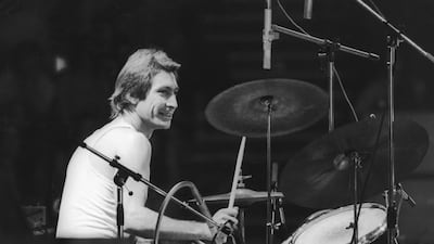 Drummer Charlie Watts of The Rolling Stones, at a British concert and sporting a new David Bowie style feather cut. Getty Images