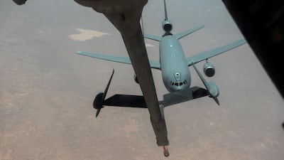 A 908th Expeditionary Air Refueling Squadron KC-10 Extender based out of Al Dhafra Air Base in Abu Dhabi, United Arab Emirates, receives fuel from another KC-10 in an undisclosed location in the Gulf. Reuters