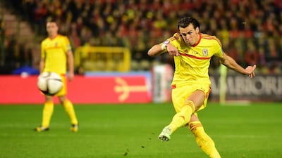 Wales' Gareth Bale hits a free kick during his side's 0-0 draw with Belgium in Euro 2016 qualifying on Sunday night. Emmanuel Dunand / AFP / November 16, 2014