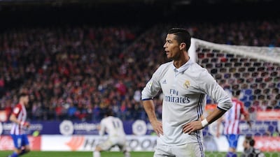 Cristiano Ronaldo of Real Madrid celebrates after scoring Real's third goal against Atletico Madrid at Vicente Calderon on November 19, 2016 in Madrid, Spain. Denis Doyle / Getty Images