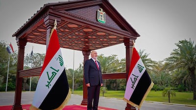 Iraq's new President Nizar Amedi inspects a guard of honour during his inauguration in Baghdad. AFP