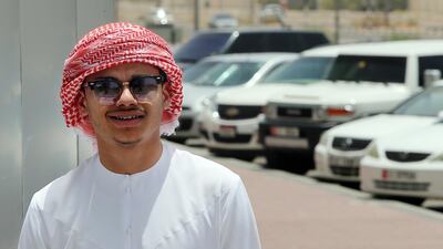 After seeing a car flip over at high speed in Al Ain, 18-year-old Mohammed Al Nuaimi pulled over and helped to rescue six young women who were trapped inside the vehicle. Satish Kumar / The National