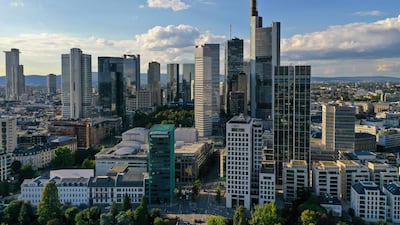 A view of the skyscrapers huddled together in Frankfurt's financial district. German fund association BVI claimed the 'Big Three' credit ratings agencies are "exploiting their dominant market position". Bloomberg