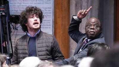 A protester is removed from the room after interrupting Mr Lammy's speech at London’s Guildhall