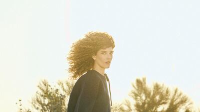 Jumper, Dh5,650; skirt, Dh18,000; and pumps, Dh4,200, all from Gucci. Bag, Dh4,373, Christian Louboutin