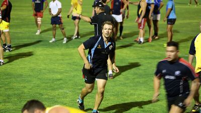 Former Abu Dhabi Harlequin Ed Lewsey, center, will accompany an old teammate Mike Ballard in London this month during the Rugby World Cup. Pawan Singh