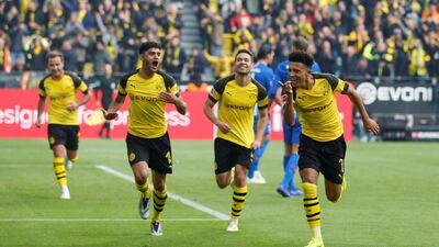 Jadon Sancho, right, joined Borussia Dortmund over the summer from Manchester City's academy and is thriving in the Bundesliga. Reuters