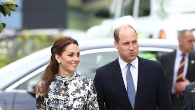 The Duchess of Cambridge wears an Erdem Sheba floral silk and cotton gown with Cassandra Goad Cavolfiore studded pearl earrings and Castener Carina style espadrille for a royal visit to the Chelsea Flower Show in London, on May 20. Reuters