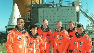 The 'pumpkin' suit adopted by Nasa for Space Shuttle missions after 1988. The orange fabric was felt to stand out better against the black of space. Nasa / AFP