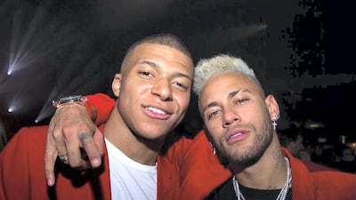 PSG's Brazilian phenom Neymar with Kylian Mbappe, and an impressive set of chains. Instagram / @neymarjr.