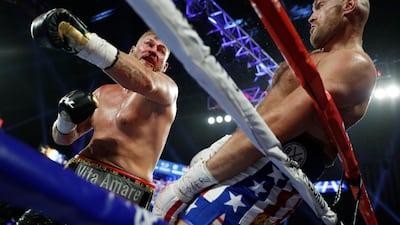 Tyson Fury, of England, right, dodges a punch by Tom Schwarz, of Germany, during a heavyweight boxing match in Las Vegas. AP Photo