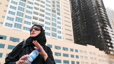 Hawwa Haide says the bedroom and kitchen of her Tower Six flat were damaged because of sprinklers. Victor Besa for The National