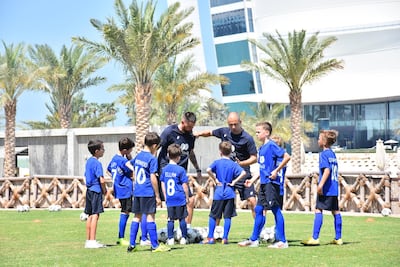 Michael Owen, Jamie Redknapp and Billy Wingrove will coach football at Dubai's Jumeirah Beach Hotel in October. Courtesy Football Escapes