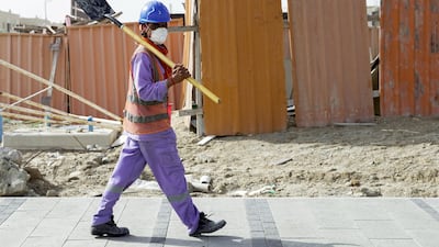 There are more than 2 million migrant workers in the Emirates who work in the construction sector - the majority from South-Asian and African countries. Victor Besa / The National