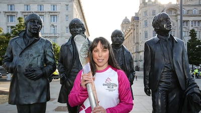 Beth Tweddle holds the Queen's Baton as it visits Liverpool. Getty Images