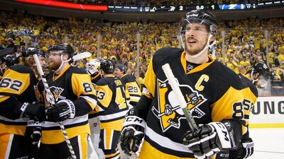 Sidney Crosby of the Pittsburgh Penguins celebrates with his teammates after defeating the Tampa Bay Lightning in Game 7 of the Eastern Conference Final during the 2016 NHL Stanley Cup Playoffs at Consol Energy Center on May 26, 2016 in Pittsburgh, Pennsylvania. Justin K Aller/Getty Images