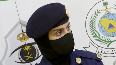 Saudi Arabian police officer Abeer Abdullah on guard during a press conference featuring the head of the Hajj security forces in Mecca. The annual pilgrimage used to draw more than 2 million people but for the second straight year it is curtailed by the coronavirus with only vaccinated people in Saudi Arabia allowed to participate.