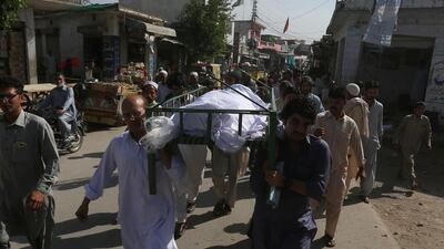 Pakistani relatives and residents carry the coffin of student Mashal Khan, who was killed by his classmates, at his funeral in Swabi district in the Khyber Pakhtunkhwa province on April 14, 2017. AFP