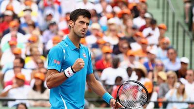 Novak Djokovic of Serbia celebrates a point against Kei Nishikori of Japan in the mens final during the Miami Open Presented by Itau at Crandon Park Tennis Center on April 3, 2016 in Key Biscayne, Florida. Clive Brunskill/Getty Images