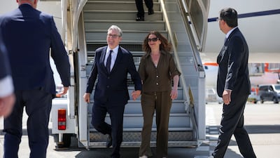 UK Prime Minister Keir Starmer arrives at Geneva airport with his wife Victoria, before travelling on to Evian. Reuters