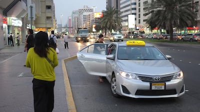 Drivers of silver taxis work for 12 hours a day to meet their Dh500 daily target, earning about Dh4,000 a month. They have to follow tough rules to avoid automated fines. Delores Johnson / The National