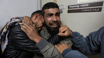 Relatives of a Palestinian teenager who was killed near the border fence, mourn at the hospital in the southern Gaza Strip November 29, 2019. Reuters