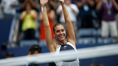 Flavia Pennetta celebrates after defeating compatriot Roberta Vinci in their women's singles final. Mike Segar / Reuters