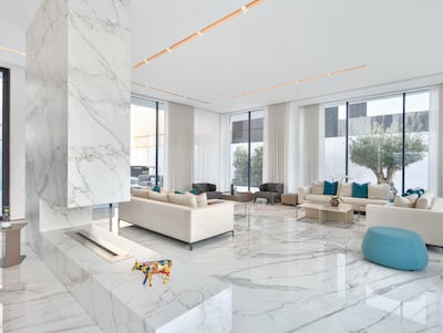 Marble is prevalent throughout the villa. Courtesy Luxhabitat Sotheby's International Realty