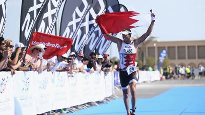 David Plese of Slovenia celebrates after winning the men's title at the Dubai International Triathlon at Atlantis, The Palm on November 7, 2014 in Dubai, United Arab Emirates. Francois Nel / Getty Images
