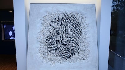 Slovenian artist Aljaz Vidrajz's mosaic, representing Sheikh Zayed's fingerprint on the world, was made using marble, glass, gold and sand from the UAE desert. Courtesy EU Delegation