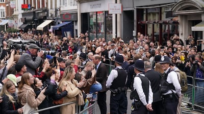 A large crowd gathered in Soho to catch a glimpse of the prince and princess. PA