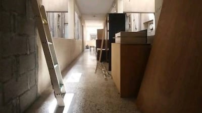 A view of a family's belongings inside of the Sheikh Rashid Colony in Karama.