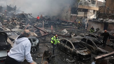 Rescuers work at the site of an Israeli strike in Beirut. Reuters