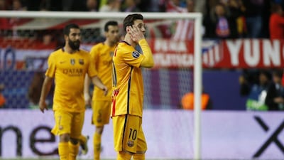 Barcelona’s Lionel Messi looks dejected after Atletico Madrid’s second goal. Reuters / Sergio Perez