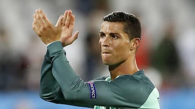 Portugal's Cristiano Ronaldo applauds fans at the end of the Euro 2016 round of 16 soccer match between Croatia and Portugal at the Bollaert stadium in Lens, France, Saturday, June 25, 2016. Portugal won 1-0. (AP Photo/Frank Augstein)