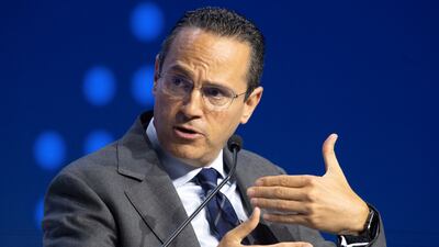 Wael Sawan speaks at an event in Abu Dhabi in October last year. AFP