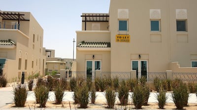 To-let signboard outside the villas in Al Furjan area near Discovery Gardens in Dubai. “The housing market is not a bubble – there are fundamentals at work,” said Alp Eke, senior economist at National Bank of Abu Dhabi. Pawan Singh / The National