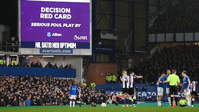 The big screen confirms red card decision against Allan. Getty