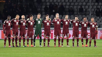 Torino’s players observe a minute of silence for the Colombia air disaster involving Chapecoense prior the Coppa Italia match against Pisa. Alessandro Di Marco / EPA