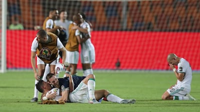 Algerian players celebrate after beating Nigeria 2-1 in their Africa Cup of Nations semi-final in Cairo. Reuters