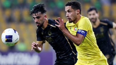 Al Wasl's Ali Saleh battles with Al Sadd's Tarek Salman in the AFC Champions League Elite match at Zabeel Stadium, Dubai on November 4, 2024. All photos Chris Whiteoak / The National