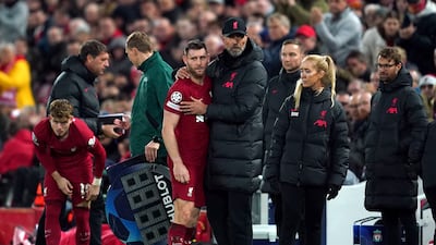 Liverpool manager Jurgen Klopp with James Milner after he is substituted. PA