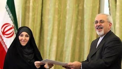 Iranian foreign minister Mohammad Javad Zarif (right) introduces Marzieh Afkham (left) as spokeswoman of the foreign ministry during a ceremony in Tehran.