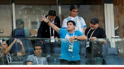 Diego Maradona gestures to fans from the stands at the Saint Petersburg Stadium during the World Cup match between Argentina and Nigeria. Reuters