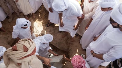 Mourners carry the body of Hayayei in July 2017, after his death in an accident in London. Antonie Robertson / The National